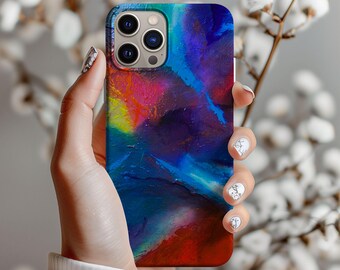 May include: A colorful abstract phone case with a blue, red, and yellow design. The case has a cutout for the camera lens.