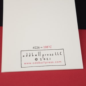 May include: A white card with black text that reads "#226 = 108&deg;C" and "oddball press LLC &copy; 2021 www.oddballpress.com".