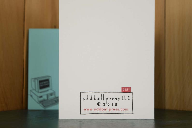 May include: A white card with black text that reads "odd ball press LLC &copy; 2015 www.oddballpress.com" and "#181" in red text.