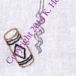 May include: Embroidered image of a corkscrew with a brown handle and a silver metal spiral. The corkscrew is next to a brown and black striped tube. The text "Copyright 2014 K. Howell" is embroidered in purple on the white fabric.