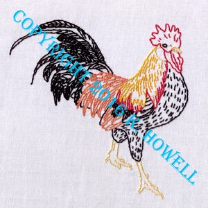 May include: Embroidered image of a rooster with a black, white, red, orange, and yellow color scheme. The rooster is facing right and has its tail feathers spread out behind it. The image is on a white background.