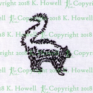 May include: Black and white embroidered image of a cat with its tail curled up. The image is on a white fabric background.