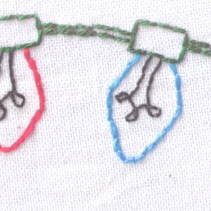 May include: A string of embroidered Christmas lights with yellow, green, red, blue, and orange bulbs.