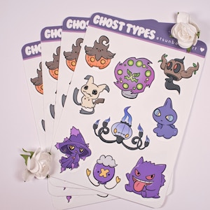 May include: A set of four sheets of stickers featuring various Pokemon characters from the Ghost type. The stickers are printed on white paper with a purple border and the text "Ghost Types" at the top. The characters include Gengar, Mimikyu, Duskull, Drifloon, Gastly, Misdreavus, and more.