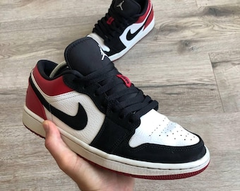 Zapatillas Jordan 1 Retro Low con puntera negra, estilo vintage