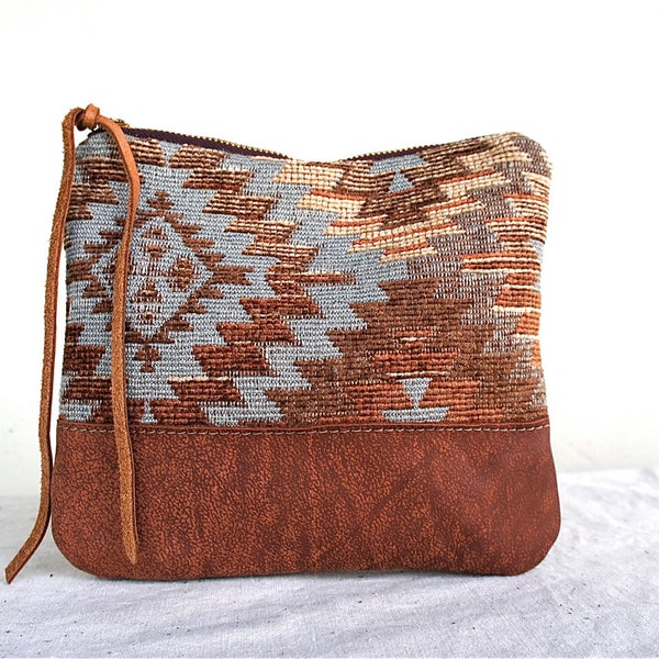 Native Vintage Carpet and Brown Leather Pouch
