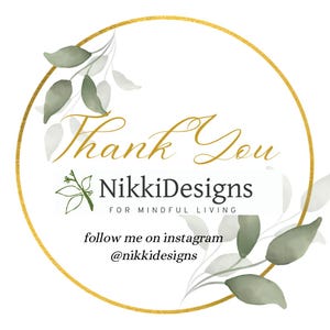 May include: A circular logo with a gold border and watercolor leaves. The words "Thank You" are in gold script. Below, the text reads "NikkiDesigns FOR MINDFUL LIVING" and "follow me on instagram @nikkidesigns".