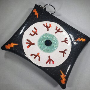 MAKE UP BAG Black Metalflake vinyl with Seafoam Iridescent glitter eyeball & Orange hologram glitter bolts image 3
