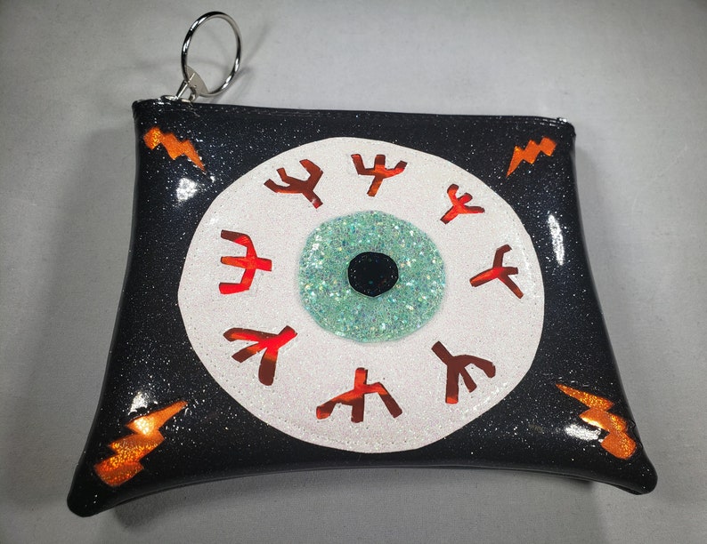 MAKE UP BAG Black Metalflake vinyl with Seafoam Iridescent glitter eyeball & Orange hologram glitter bolts afbeelding 4