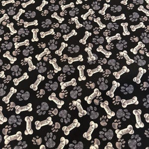 Dog Print Fabric Black Background Paws and Bones  44&quot; wide 100% cotton