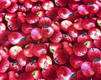 May include: A fabric pattern featuring a dense arrangement of red apples. Each apple has a green leaf and a light-colored blush, creating a vibrant and textured design. The apples are closely packed, filling the frame.