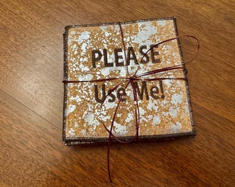 Coasters cork fabric backed with felt "Please use me!" embroidered