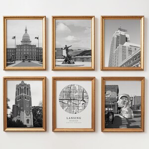Puede incluir: Seis impresiones en blanco y negro enmarcadas con marcos dorados. Las impresiones presentan escenas arquitectónicas y paisajísticas, incluyendo un edificio del capitolio, una estatua, un edificio alto, una torre del reloj, un mapa de Lansing y una escultura.