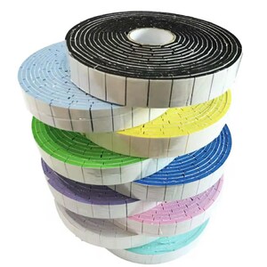 May include: A stack of colorful foam tape rolls. The rolls are in various colors, including black, blue, yellow, green, purple, pink, and teal. Each roll has a white adhesive strip along the edge. The tape is likely used for sealing or insulation purposes.