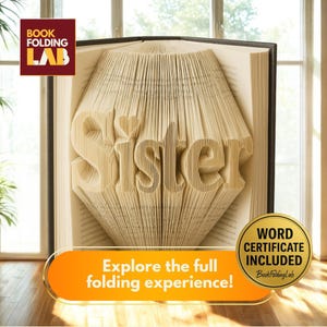May include: A book with the word "Sister" folded into the pages. The book is open, revealing the text in a 3D effect. The image includes the text "Explore the full folding experience!" and the logo for Book Folding Lab.