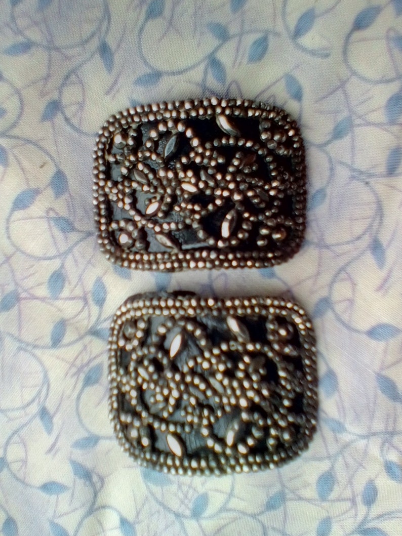 Cut steel shoe buckles 12 facets leather backed 17th-18th century