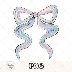 Puede incluir: Un lazo estilo acuarela en tonos pastel de azul, rosa y amarillo con detalles dorados. El lazo tiene un nudo central y cintas largas y fluidas. La palabra "PNG" se muestra en negrita.