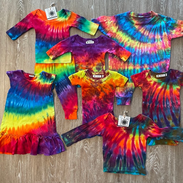 A Selection of Rainbow Baby clothes in natural fibers