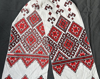 hand-embroidered tablecloth with a geometric pattern