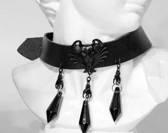 GARGOYLE CHOKER: Black or red pvc choker with crystals and small metal bats