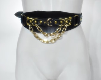 MOONFACE BELT: Leather corset harness with metal chains and golden moon face detail
