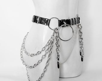 CALIGULA BELT: Pvc vinyl belt with big O-rings, chains and crystals