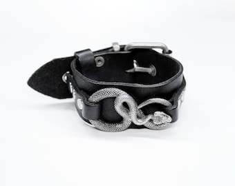 SNAKE BRACELET: Leather cuff wristband with metal snake detail