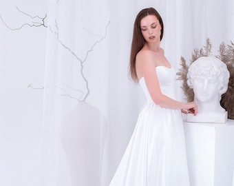 Ivory Satin Corset Wedding Dress: A-Line Bridal Gown with Train