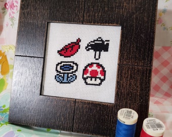 Bordado de punto de cruz TERMINADO - Objetos especiales de Super Mario 3: fuego, flor, hoja, martillo, champiñón