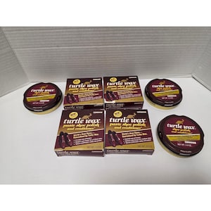 May include: Three round metal tins and two rectangular cardboard boxes of Turtle Wax paste shoe polish and conditioner in the colour cordovan. Each container features the brand logo, product name, and a net weight of 56.7 grams printed on them.