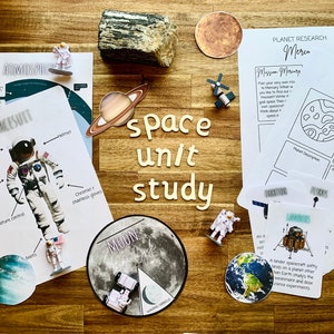 May include: A space unit study set with a variety of educational materials, including a spacesuit diagram, planet research sheets, and a moon chart. The set also includes toy astronauts and spacecrafts.