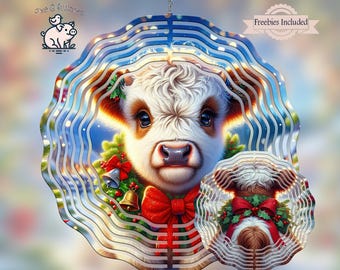 May include: A metal wind spinner with a white and brown cow wearing a red bow and a green wreath with red berries and bells. The background is a blue and white swirl pattern.