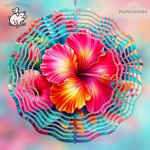 May include: A vibrant, layered wind spinner featuring a large, colorful hibiscus flower in shades of pink, orange, and yellow. The spinner has a wavy, layered design with tropical leaf patterns and the text "Freebies Included".
