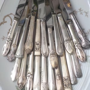 Mismatched vintage silverplate Assorted dinner knives sold by the each