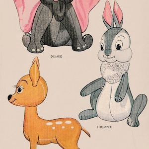 May include: A vintage illustration of three Disney characters: Dumbo the elephant with large pink ears, Thumper the rabbit with a white fluffy collar, and Bambi the deer with brown fur and white spots. The illustration is on a light beige background.