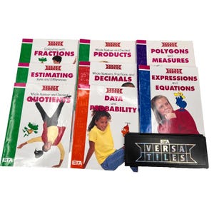 May include: A collection of educational books with titles like "Computing with Fractions," "Whole Number and Decimal Products," and "Expressions and Equations." The books feature colorful covers with illustrations and the "ETA Versa Tiles" logo.