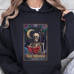 The Reader Tarot Card Sweatshirt, Skeleton Reading Shirt, Unisex Tarot Card Shirt, Book Lover Gift, Bookish Gift,Tarot Lover Gift
