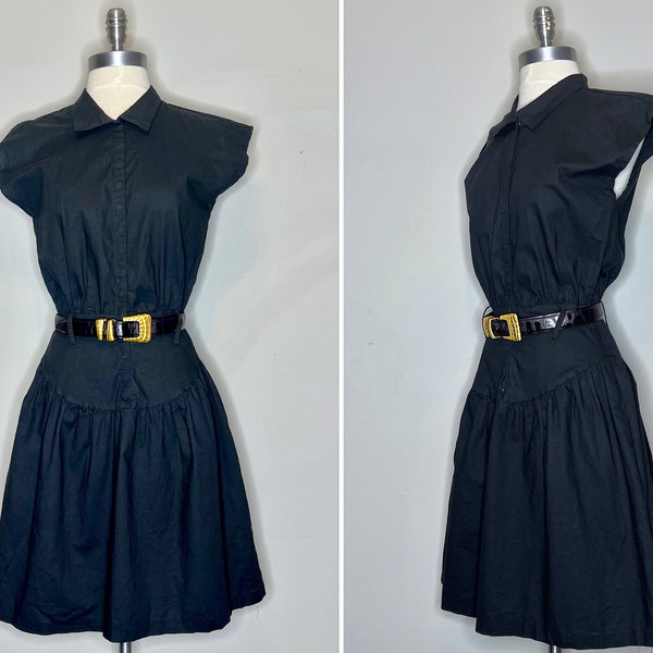 1980s Wild Dress Black Sleeveless Cotton Poly Drop Waist Mini Dress with Snaps/Wide Belt Loops/Gathered Skirt/Side Pockets/Vintage Size 9/10