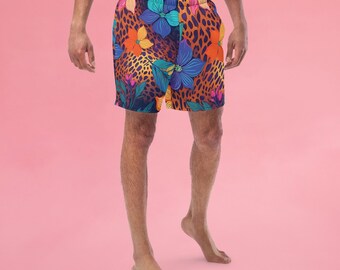 May include: A pair of colorful floral print swim trunks with a leopard print background. The trunks have a drawstring waist and are made of a lightweight fabric.
