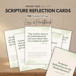 May include: A set of Scripture Reflection Cards, pocket size 3.5 x 5 inches, with the theme of "Loss & Heartbreak." The cards feature inspirational quotes and text, with a soft, neutral color palette. Includes free printable gift tags.
