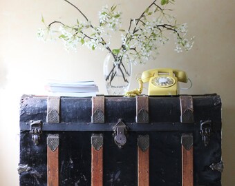large black antique steamer trunk blanket chest