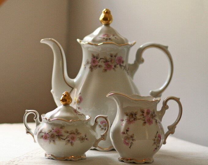 Reserved.....vintage Teapot Creamer Sugar Springtime Pattern