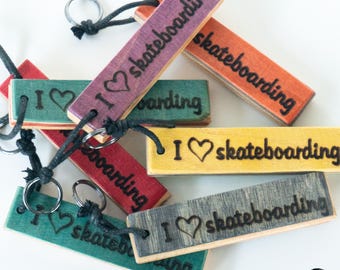 Personalized keychains made from used recycled skateboards (used back)