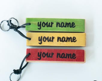 Customizable keychains made from used, recycled skateboards