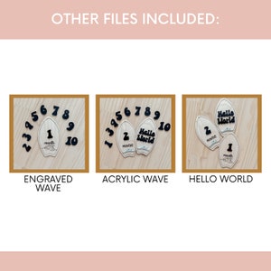 May include: Three wooden surfboard-shaped baby milestone markers with black numbers and text. The first marker has the numbers 1-10 engraved on it. The second marker has the numbers 1-10 and the text "Hello World" printed on it. The third marker has the text "Hello World" printed on it.