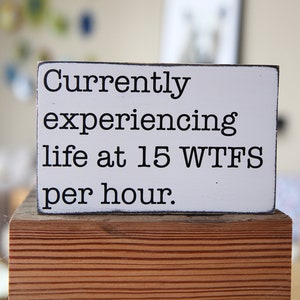 Funny desk sign - Currently experiencing life at 15 WTFS per hour