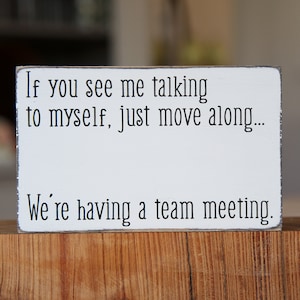 Funny desk sign | If you see my talking to myself, just move along... we're having a team meeting.