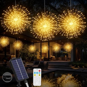 May include: Outdoor solar-powered string lights in a starburst design. The warm white lights are suspended from the ceiling and are controlled by a remote. The lights are powered by a solar panel and are ideal for outdoor decor.