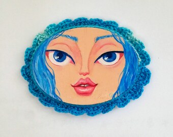 Miniature Painting Girl with big eyes with Crocheted Frame color Electric Blue