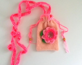 Crocheted pink pouch victorian style with flower